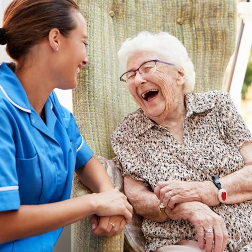 sharing a laugh with home caregiver